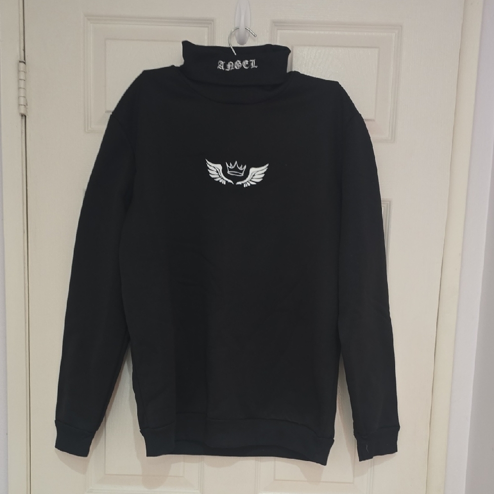 Elegant Black Turtleneck Sweater with Embroidered Design